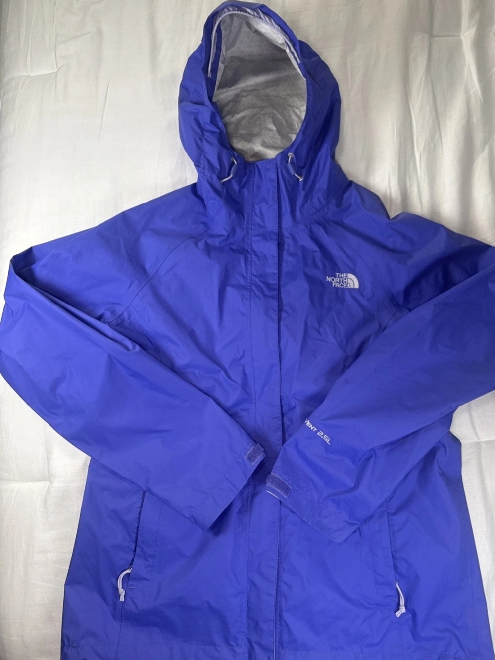 The North Face Women's Waterproof Hooded Jacket in Bright Purple damaged a littl